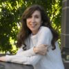 Author Kate Murphy - Woman in white long-sleeve sweater in front of tree